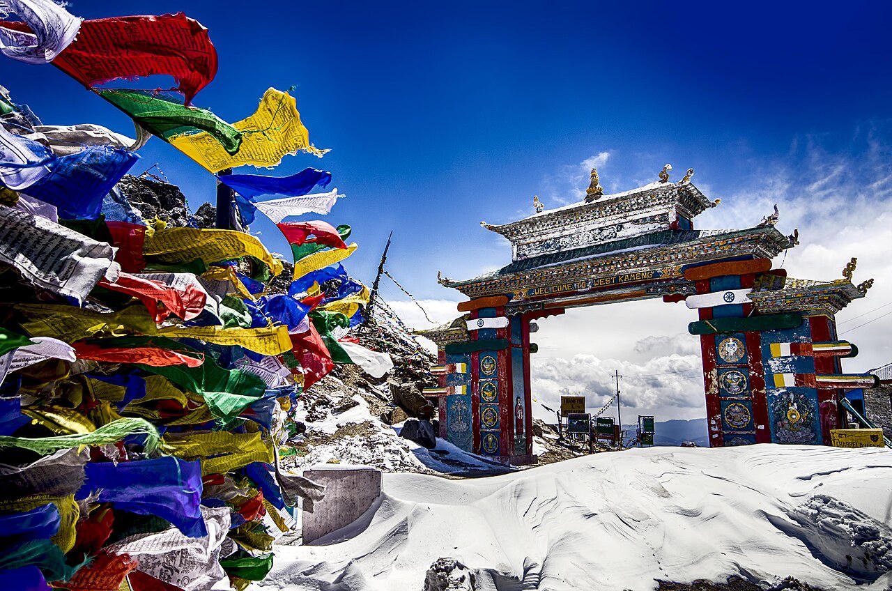 Prayer flags and gate at Sela Pass